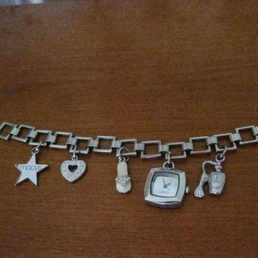 Macy's charm Bracelet with working watch.